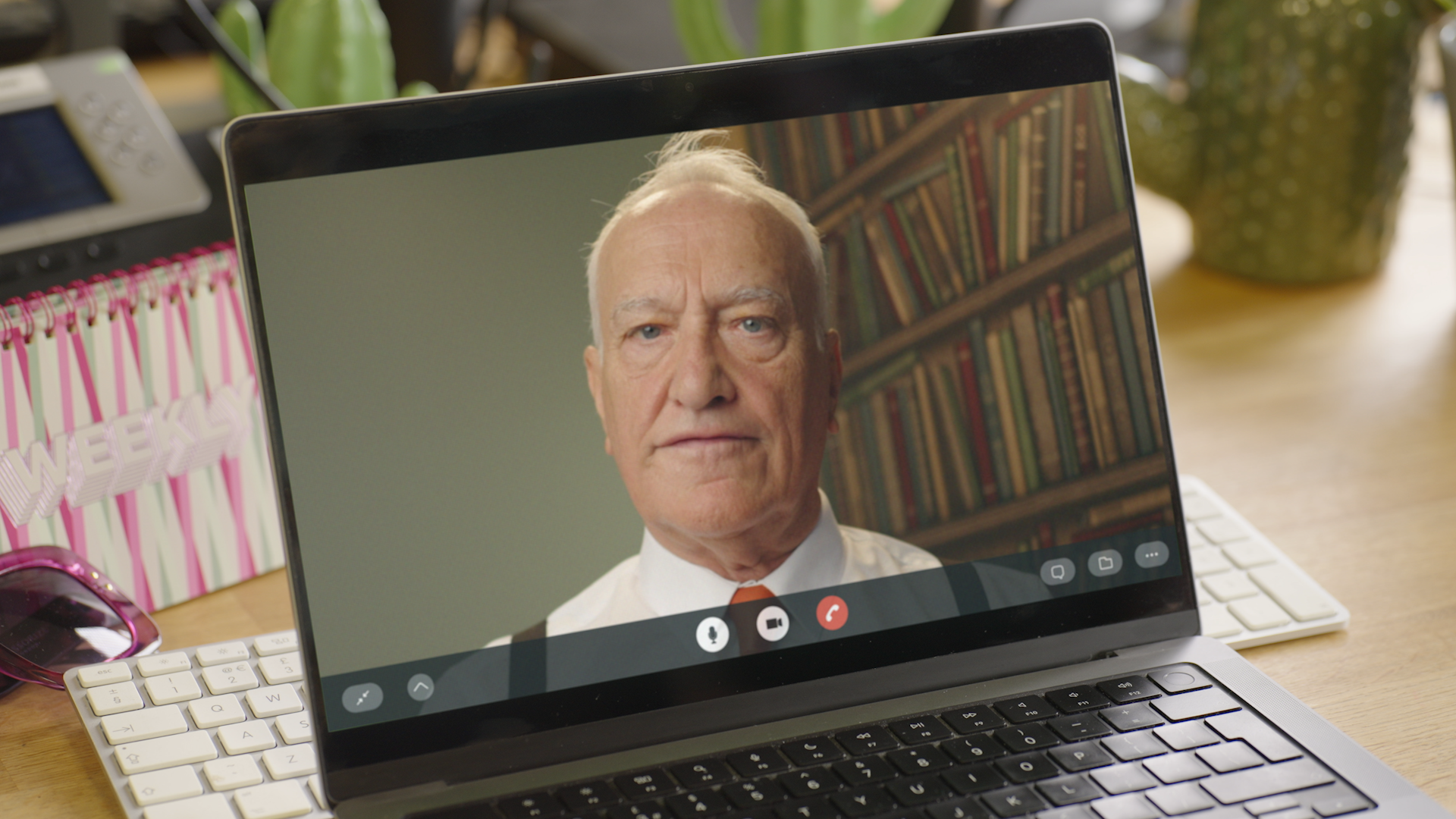 Man on video call on laptop